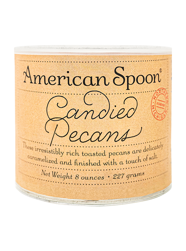 an 8 oz container of candied pecans