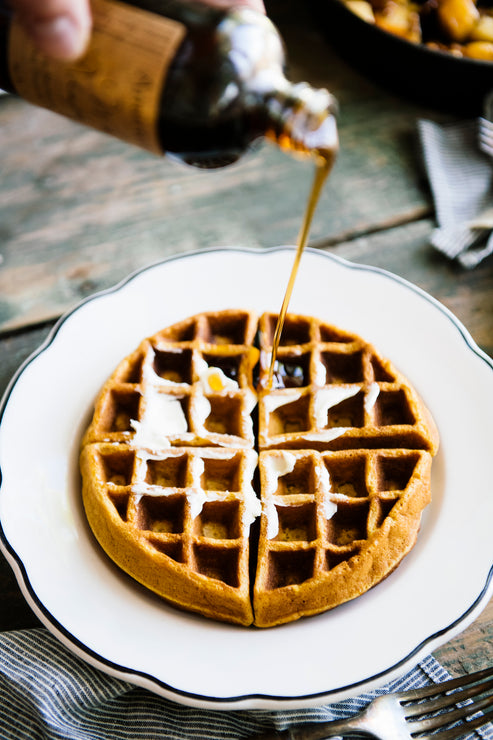 Load image into Gallery viewer, a waffle topped with Maple Syrup