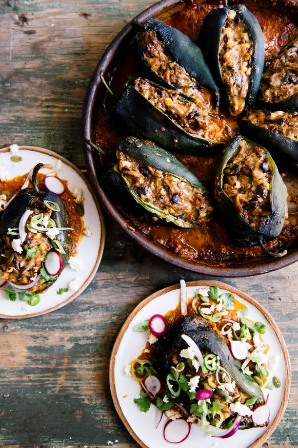 Stuffed poblano peppers made with Pumpkin Seed Salsa