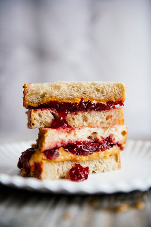 Load image into Gallery viewer, stacked peanut butter and jam sandwiches