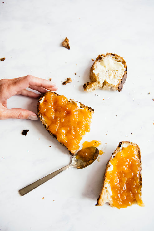 Load image into Gallery viewer, A few slices of toast with preserves and one with butter