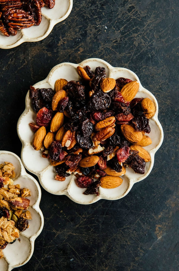a round plate of candied pecans