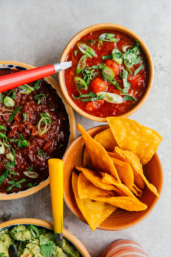 an array of salsa and guacamole
