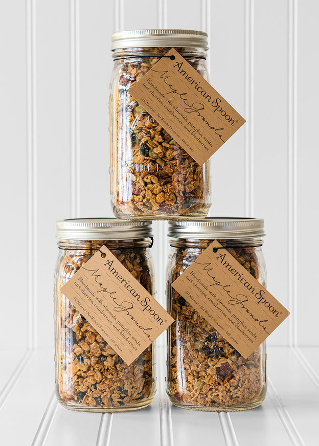 A stack of three jars of Maple Granola