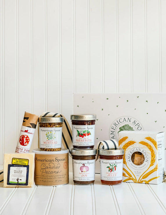 Load image into Gallery viewer, The Entertainer gift including Haute Porc Salami, Prairie Breeze Cheese, Whole Seed Mustard, 8 oz Candied Pecans, Sour Cherry Preserves, Apple & Onion Jam, Jalapeno Pepper Jelly, American Spoon Original Crackers and a gift box