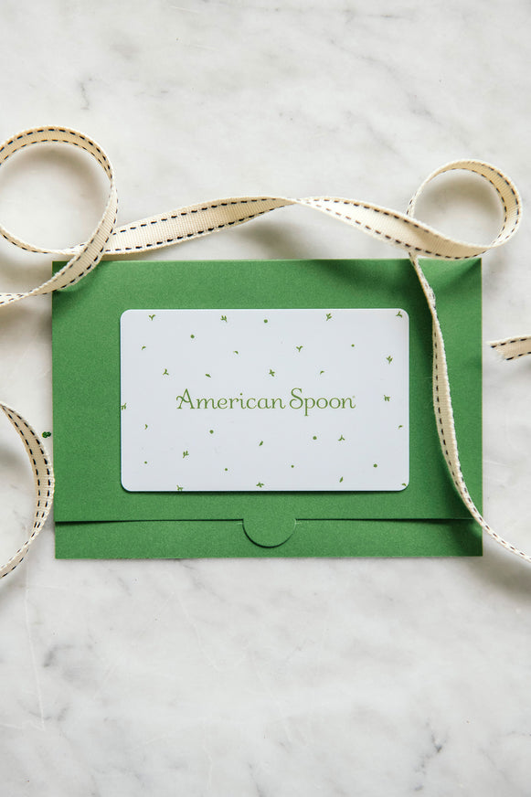 american spoon gift card in a holder surrounded by ribbon