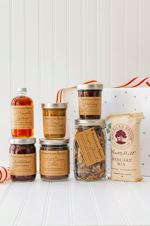 Load image into Gallery viewer, The Christmas Cheer gift box including maple syrup, Christmas cherries, boozy butterscotch, hot cocoa mix, holiday jam, maple granola and wheat & malt pancake mix