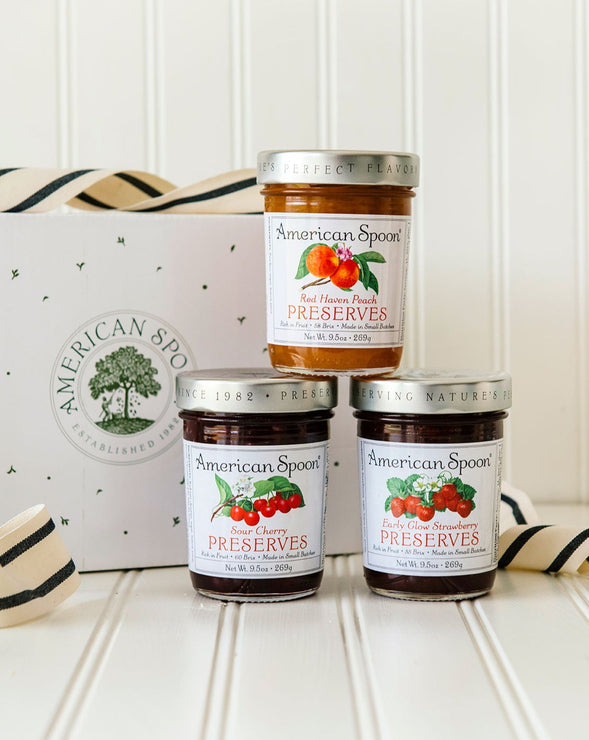 Load image into Gallery viewer, The Favorite Preserve Trio gift box containing Sour Cherry Preserves, Early Glow Strawberry Preserves and Red Haven Peach Preserves
