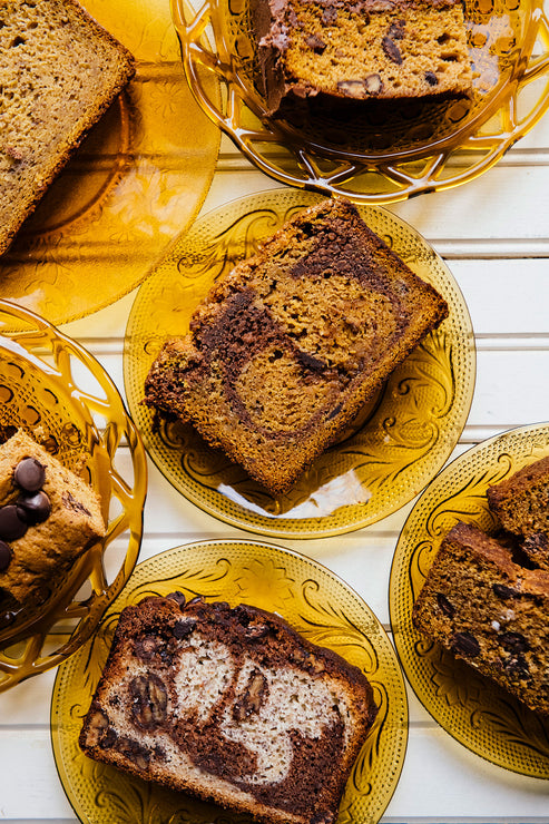 Load image into Gallery viewer, slices of chocolate chip pumpkin and banana bread