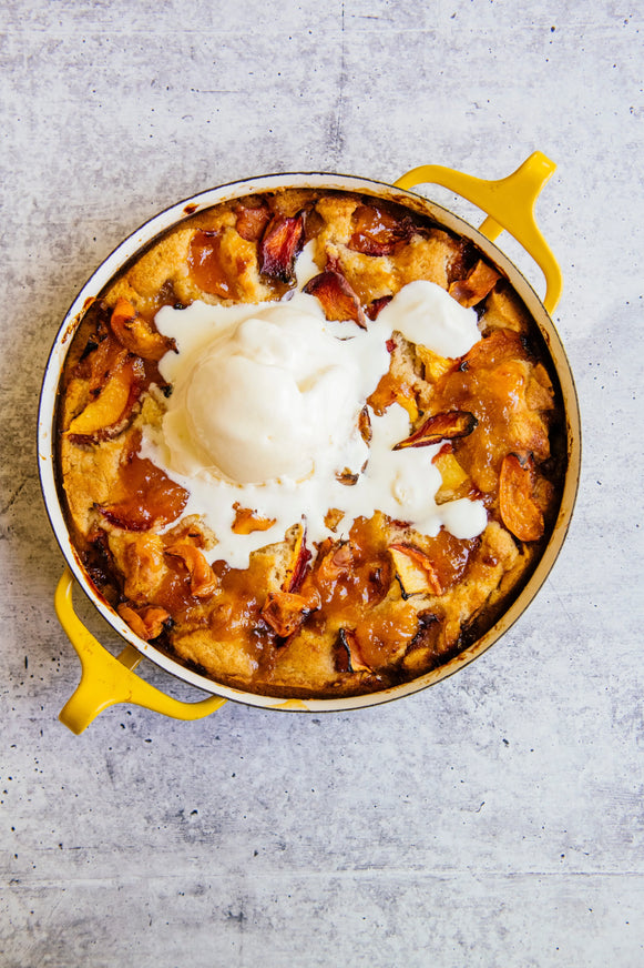 Peach cobbler with vanilla ice cream