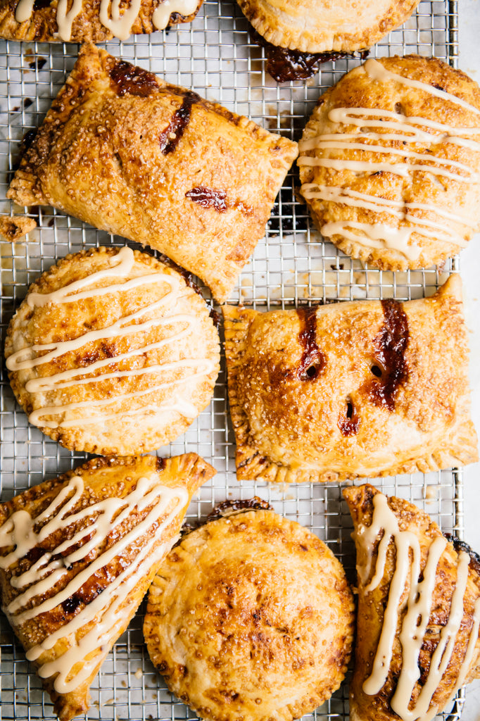 A tray full of hand pies topped with Michigan Maple Cream and filled with preserves
