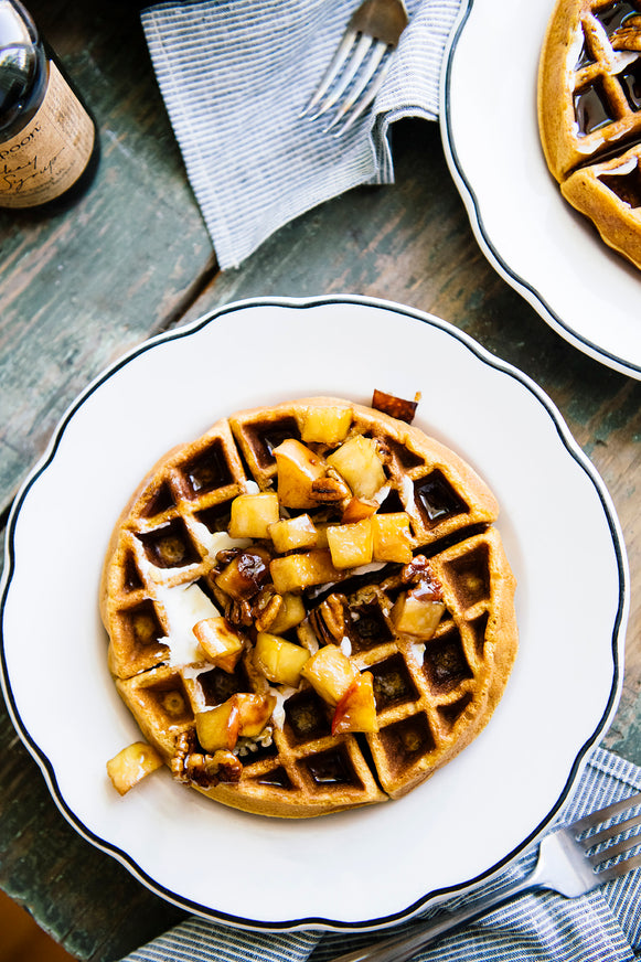 Waffles with sauteed apples, butter and Maple Syrup