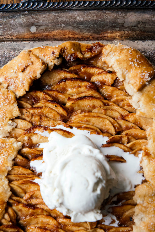 Load image into Gallery viewer, An apple galette with vanilla ice cream