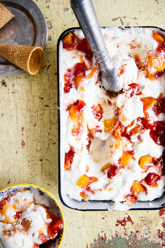Scoops of ice cream made with fresh peaches and Red Haven Peach Preserves