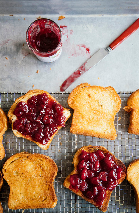 Load image into Gallery viewer, Slices of toast topped with Fruit Perfect Sour Cherries