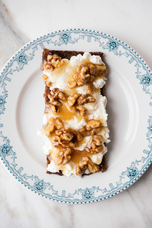 Load image into Gallery viewer, Ricotta toast topped with walnuts and Star Thistle Honey

