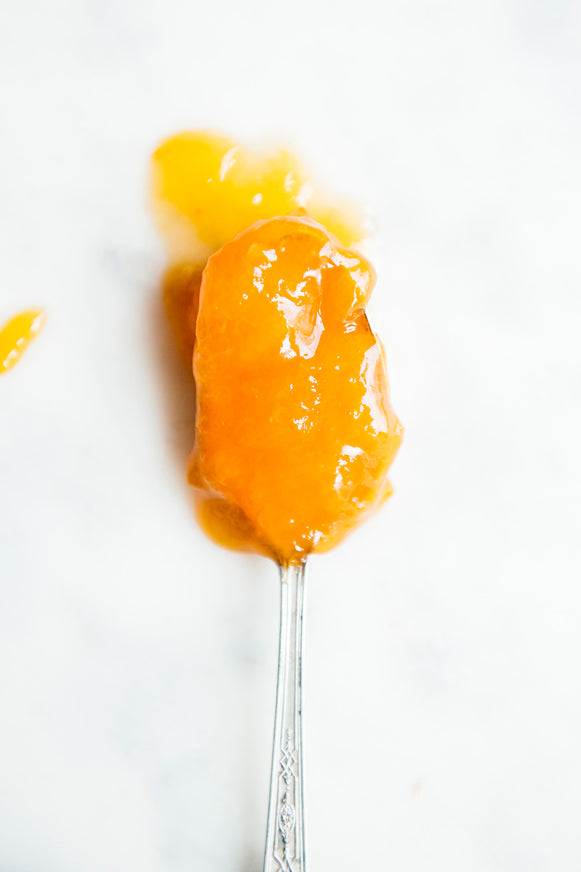 A spoon full of preserves