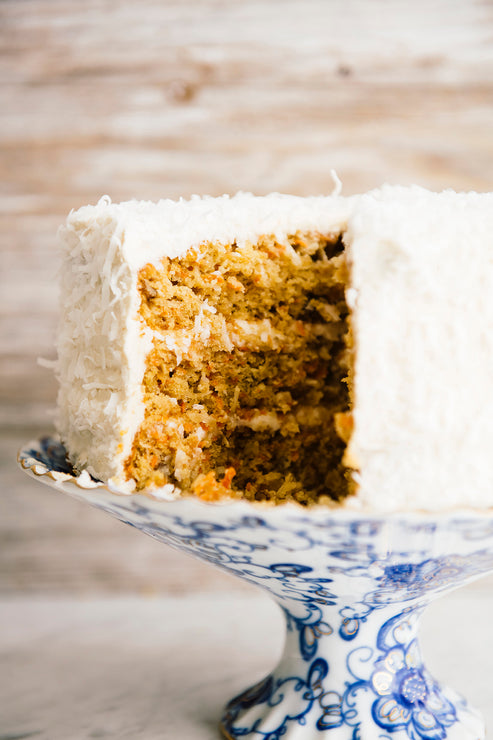 Load image into Gallery viewer, Carrot Cake with Maple Cream frosting
