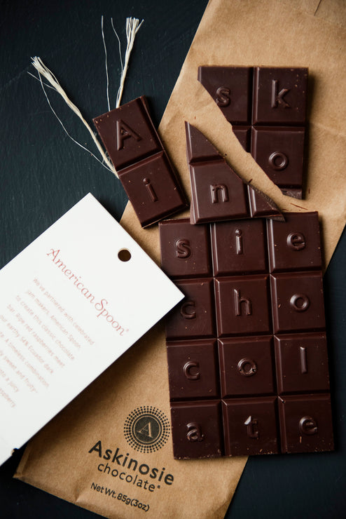 Load image into Gallery viewer, Pieces of a Dark Chocolate &amp; Raspberry Askinosie Chocolate Bar
