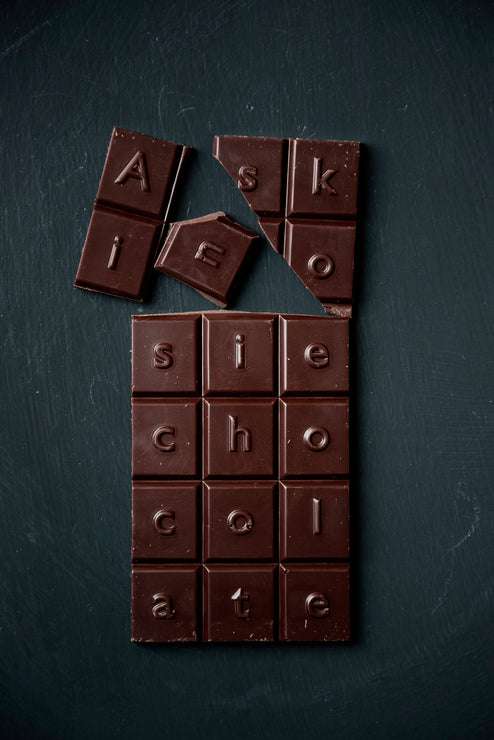 Load image into Gallery viewer, Pieces of a Dark Chocolate & Raspberry Askinosie Chocolate Bar
