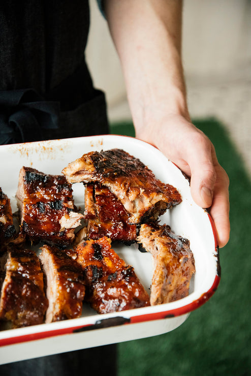 Load image into Gallery viewer, A rack of ribs made with American Spoon Grilling Sauce