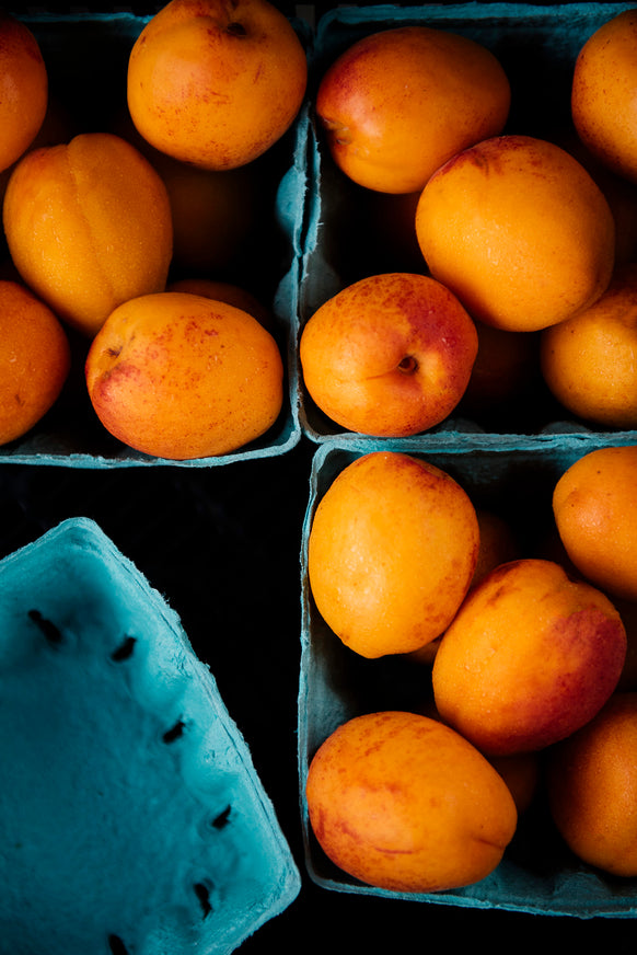 Pints of ripe apricots