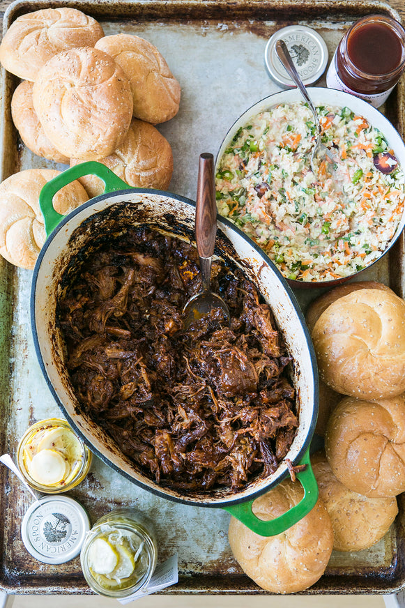 Pulled pork made with American Spoon Grilling sauce, coleslaw and buns