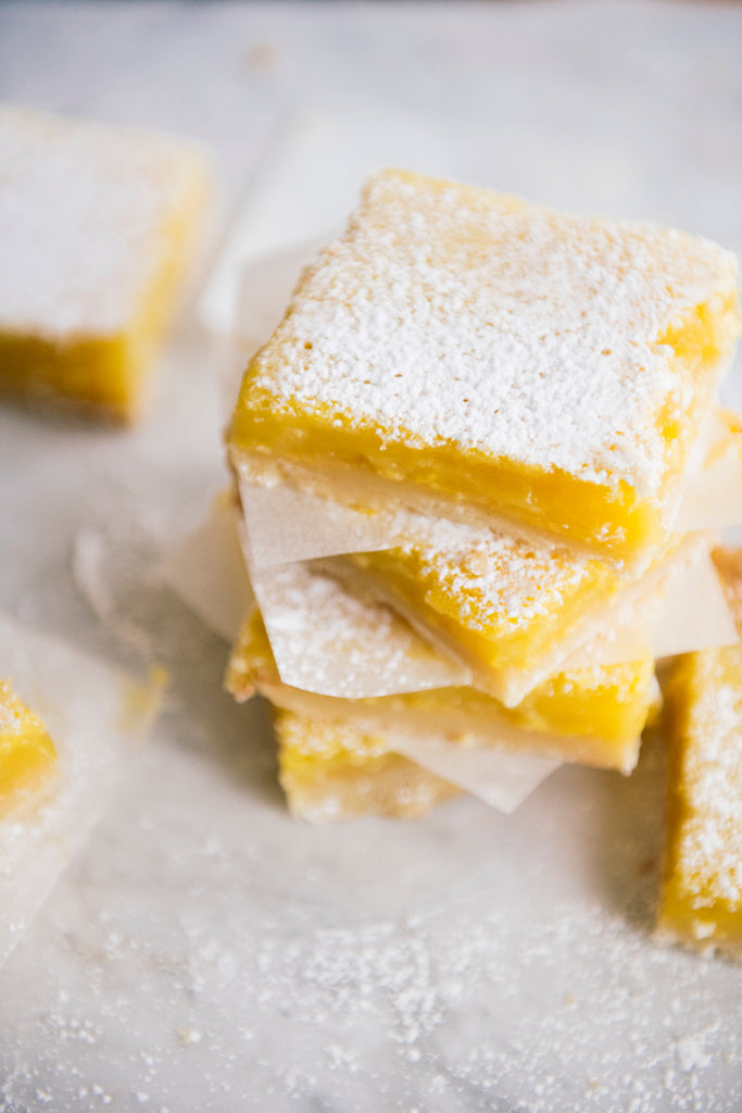 a stack of homemade lemon bars