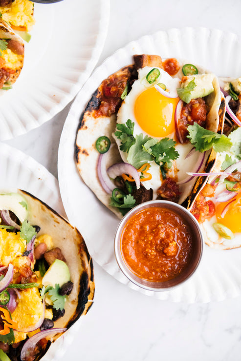 Load image into Gallery viewer, Breakfast tacos with a side of Pumpkin Seed Salsa
