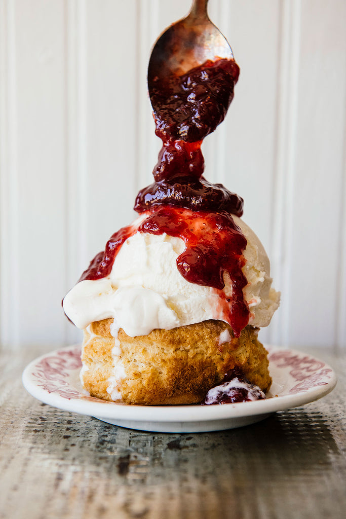 Single homemade biscuit with vanilla ice cream and Fruit Perfect Sour Cherries