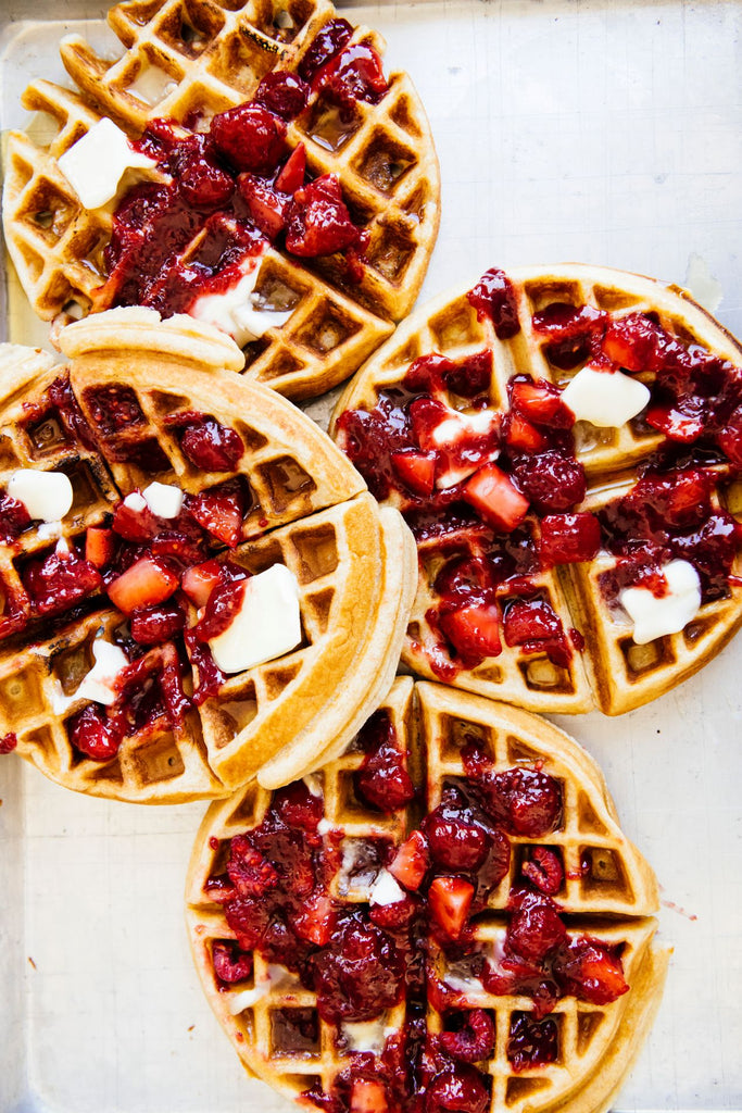 waffles topped with butter and compote