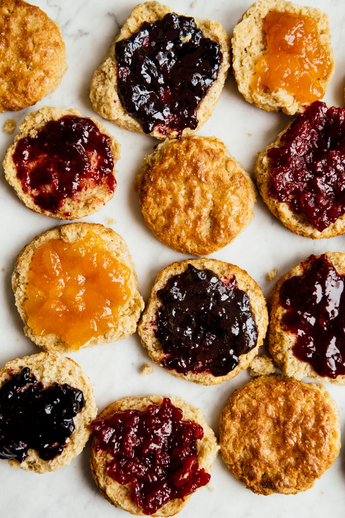 homemade biscuits topped with jams and preserves