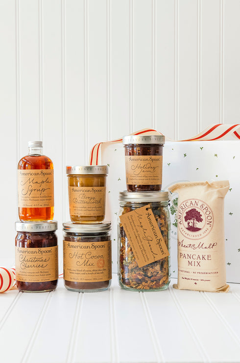 Load image into Gallery viewer, the christmas cheer gift box including maple syrup, christmas cherries, boozy butterscotch, hot cocoa mix, holiday jam, maple granola and wheat &amp; malt pancake mix
