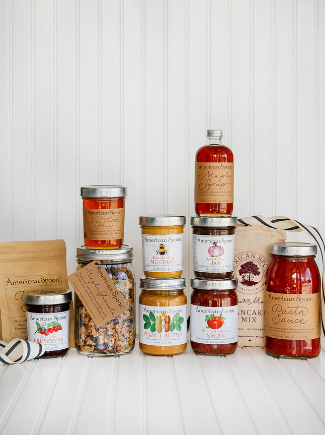The Ultimate Pantry Kit including Biscuit Mix, Sour Cherry Preserves, Maple Granola, Star Thistle Honey, Peanut Butter, Wildflower Mustard, Maple Syrup, Pancake Mix, Apple & Onion Jam, Tomato & Cilantro Salsa, and Pasta Sauce 