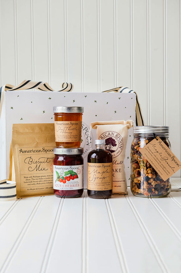 The Good to the Grain gift box containing Wheat & Malt Pancake Mix, Maple Syrup, Biscuit Mix, Fruit Perfect Sour Cherries, Star Thistle Honey and Maple Granola