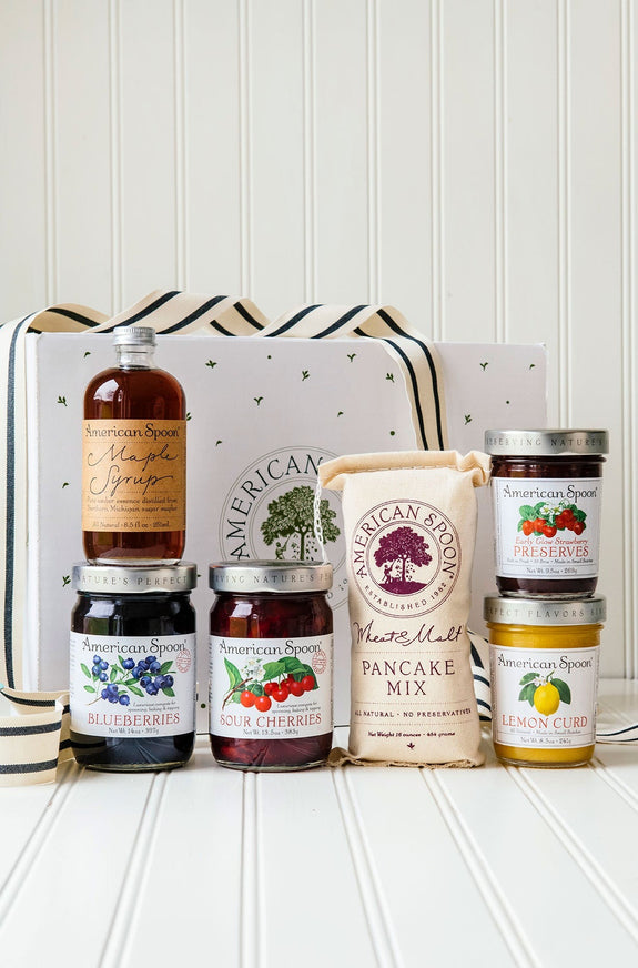 The Up North Breakfast Box gift box containing Wheat & Malt Pancake Mix, Maple Syrup, Fruit Perfect Sour Cherries, Fruit Perfect Blueberries, Lemon Curd and Early Glow Strawberry Preserves 