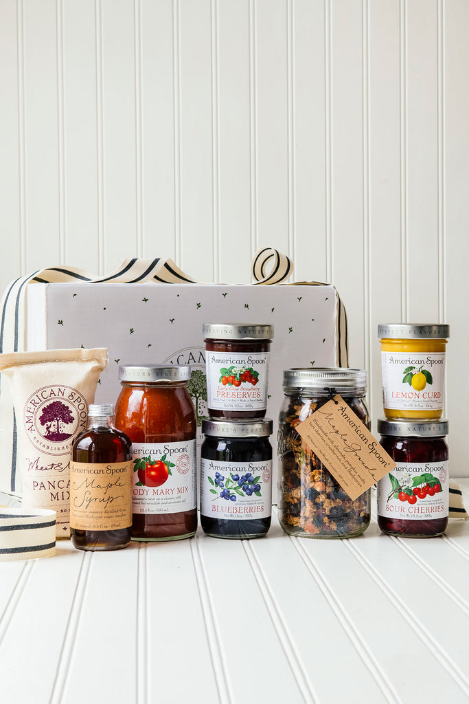 The Weekend Brunch Box gift box containing Bloody Mary Mix, Maple Syrup, Early Glow Strawberry Preserves, Wheat & Malt Pancake Mix, Fruit Perfect Sour Cherries, Fruit Perfect Blueberries, Lemon Curd and Maple Granola