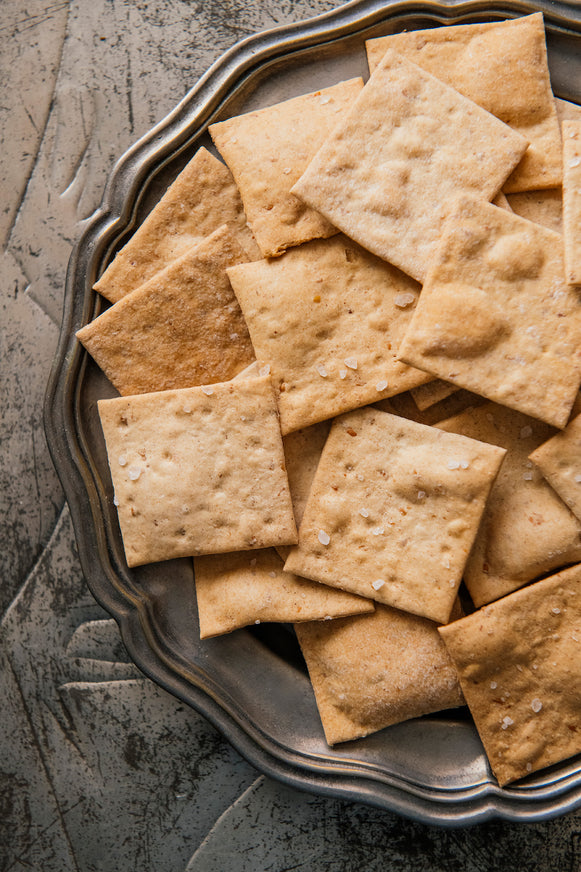 American Spoon Classic Crackers on a metal tray with a textured background