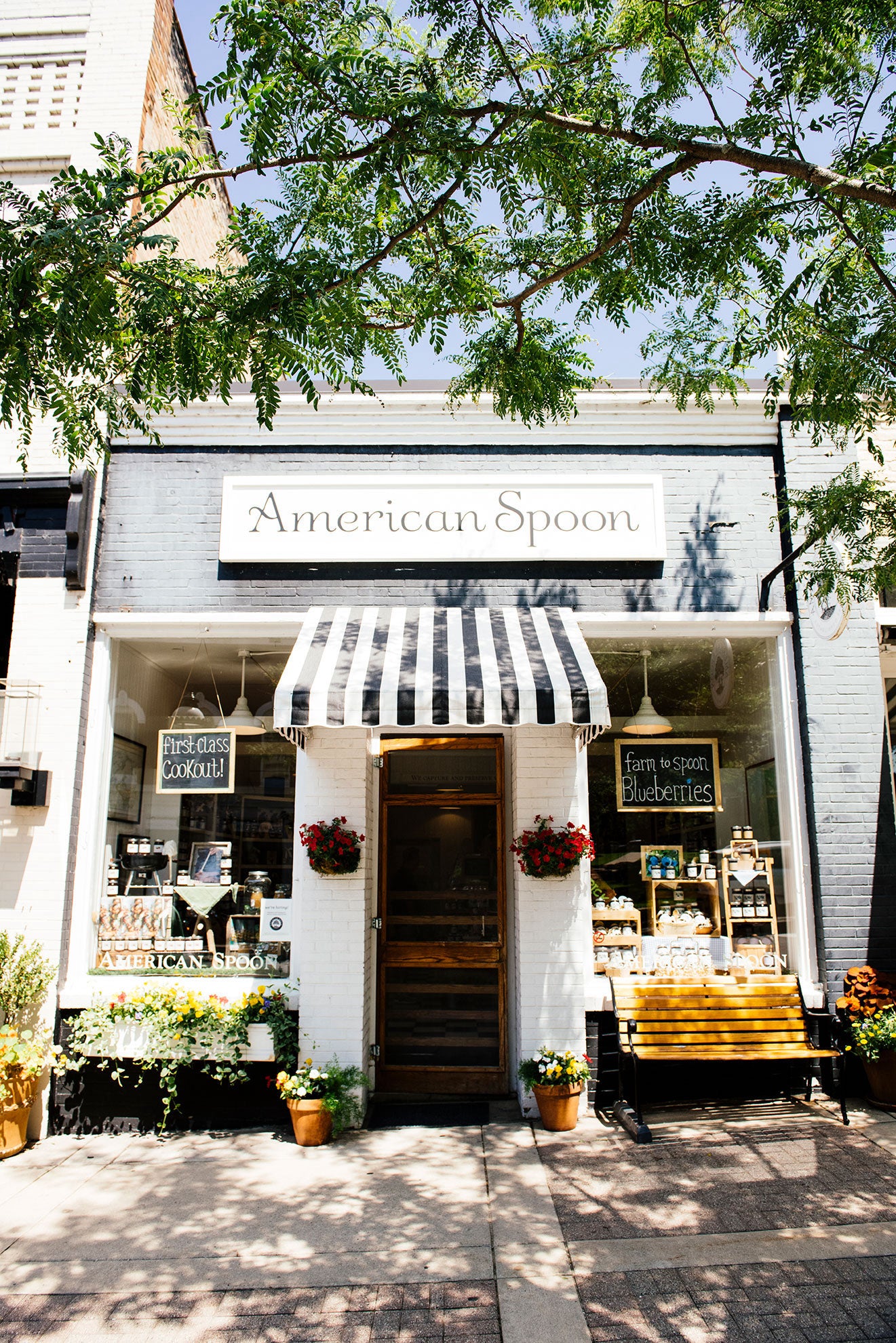 the Buy the Store gift box with products stacked around an american spoon gift crate