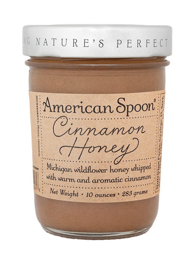 Jar of American Spoon Cinnamon Honey on a white background