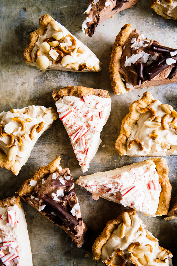 A tray full of slices of pie