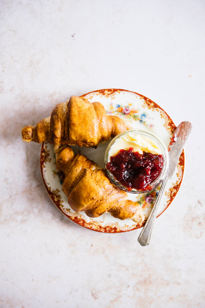 Croissants with fresh butter and preserves