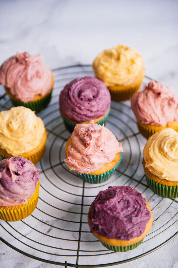 Cupcakes topped with frosting made with preserves