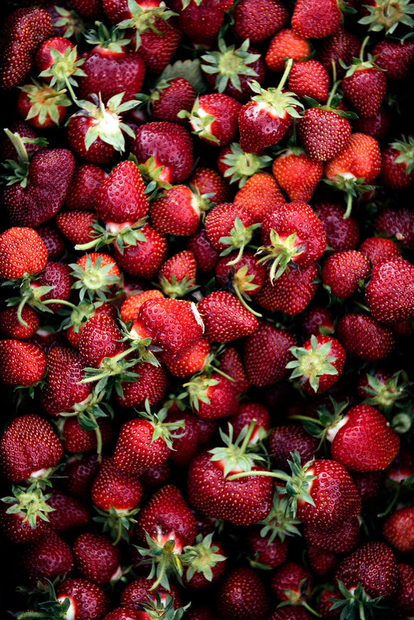 Piles of fresh strawberries