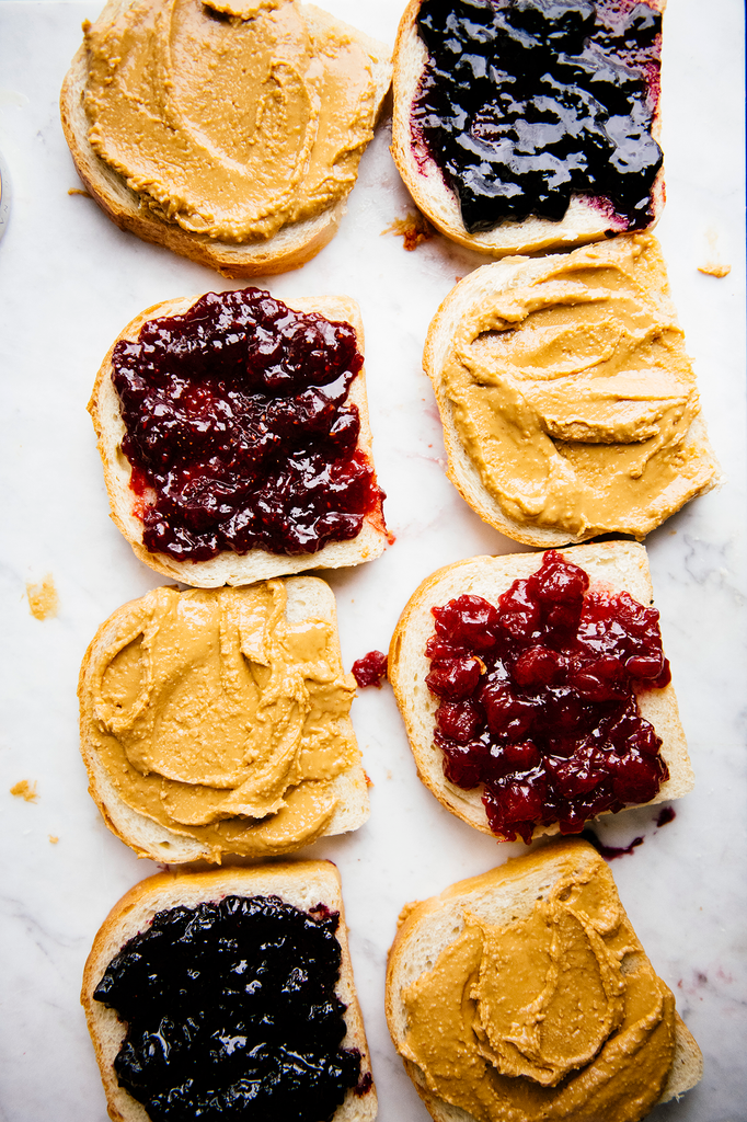 Slices of toast covered in Peanut Butter and preserves