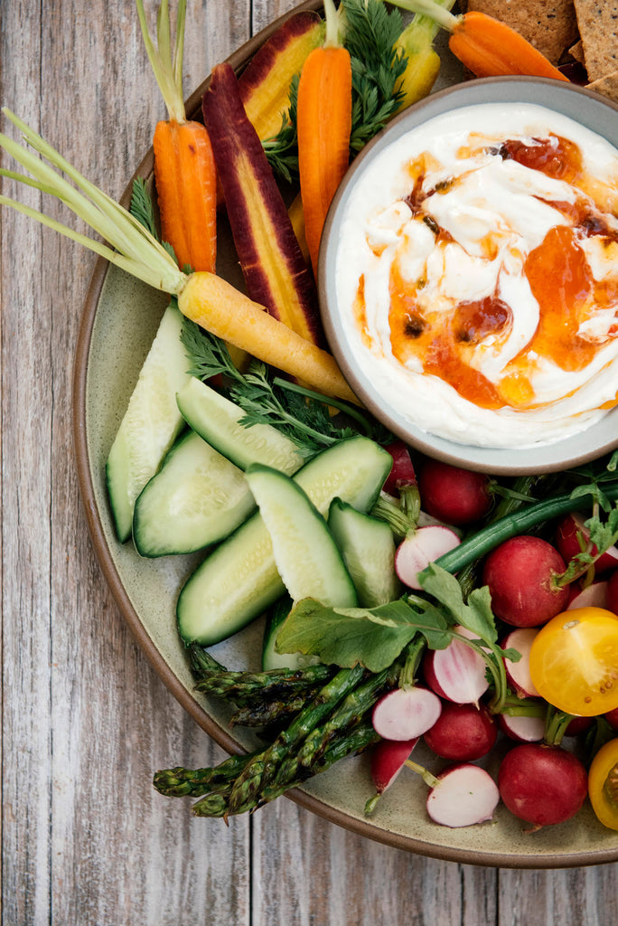 A tray of fresh vegetables and dip made with Jalapeno Pepper Jelly