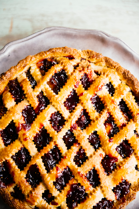 A homemade lattice pie filled with Christmas Cherries