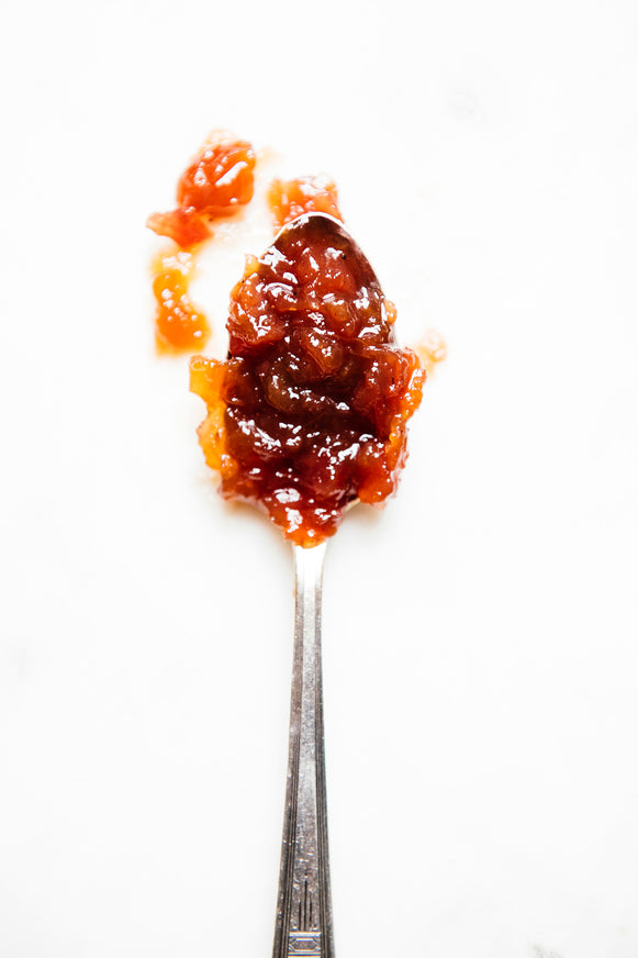 A spoon full of preserves