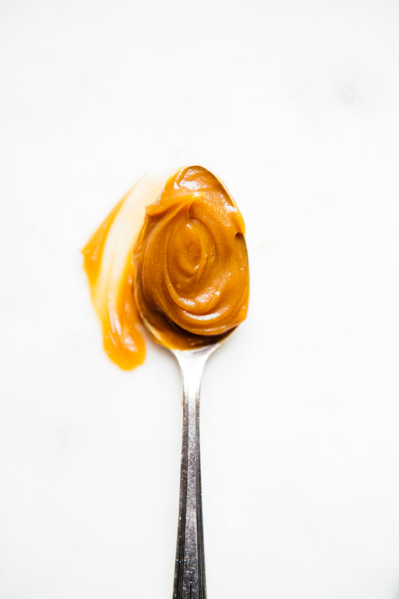 A spoon of Salted Maple Caramel