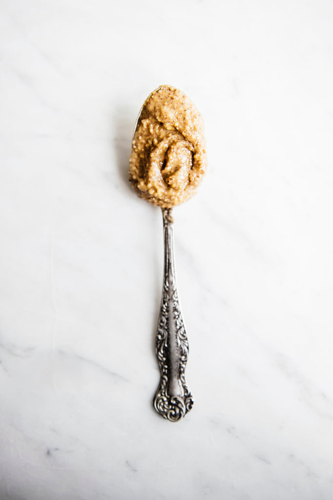A spoon of Almond Butter